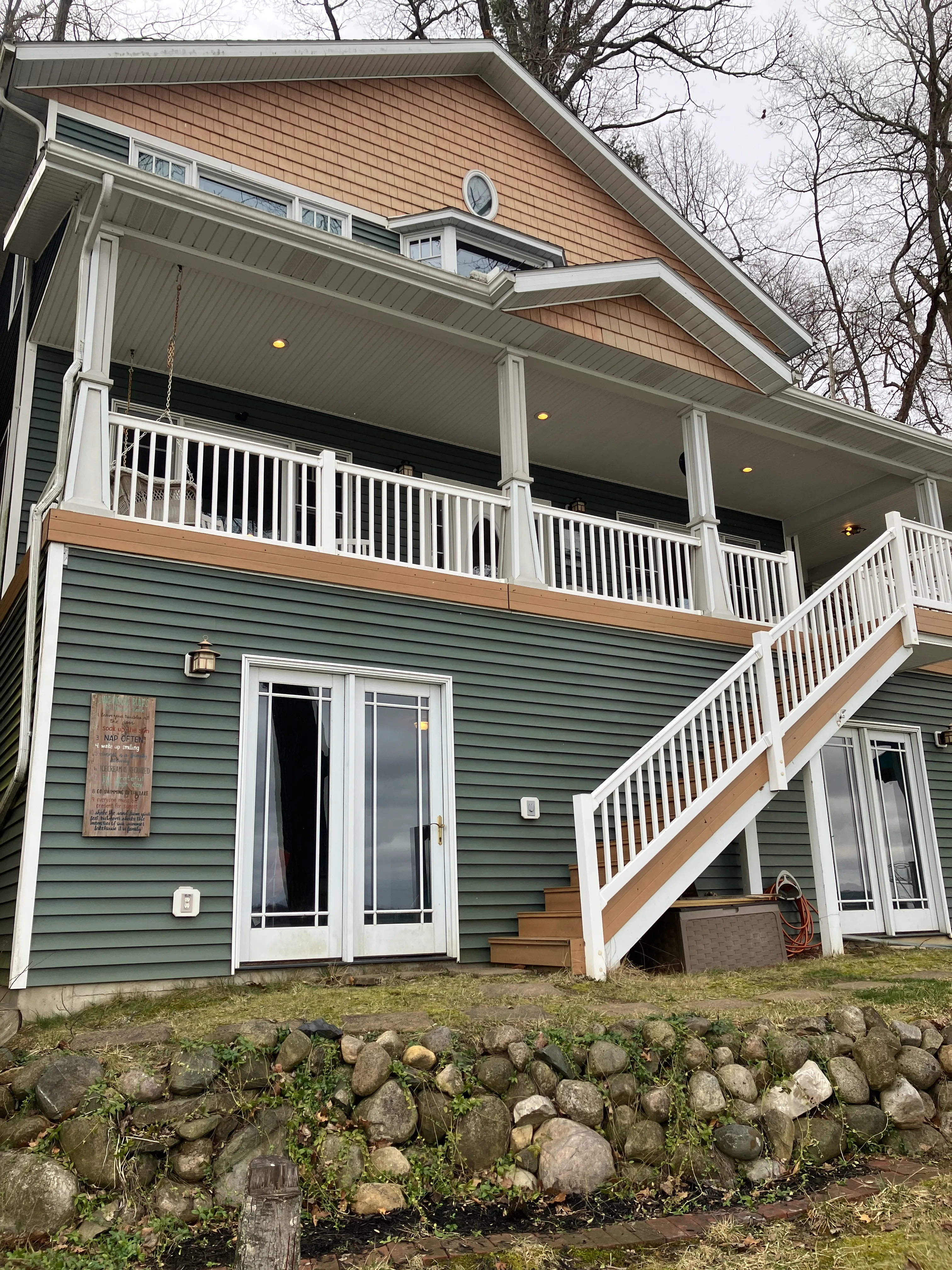 Front exterior of Klinger Kastle with stairs leading to the entrance.