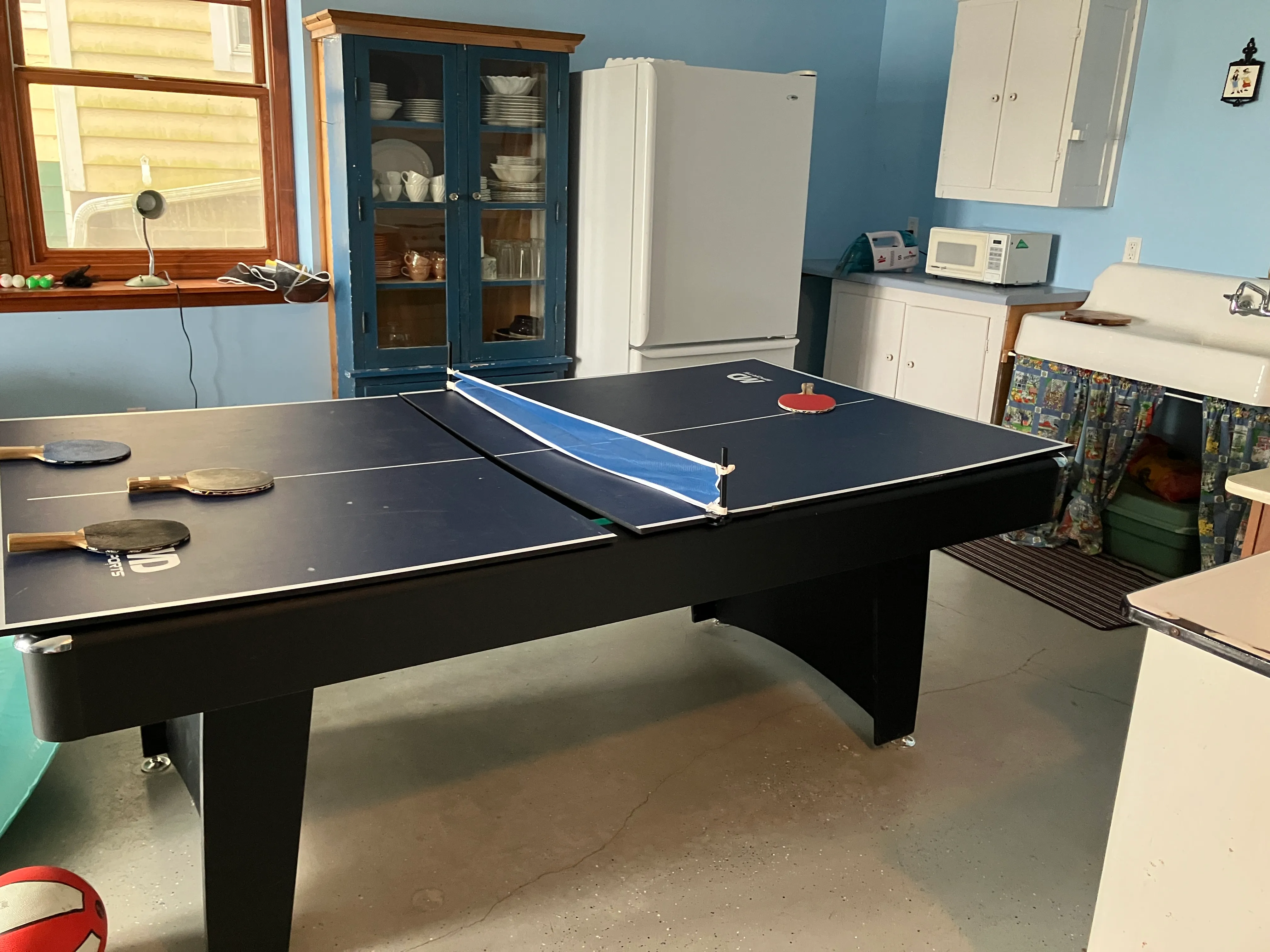 Ping pong and billiards table in the rec area.